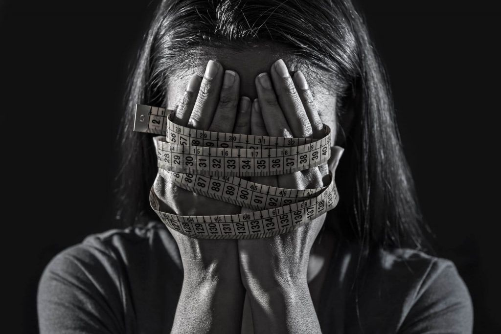 How do eating disorders affect the neurobiology of the brain